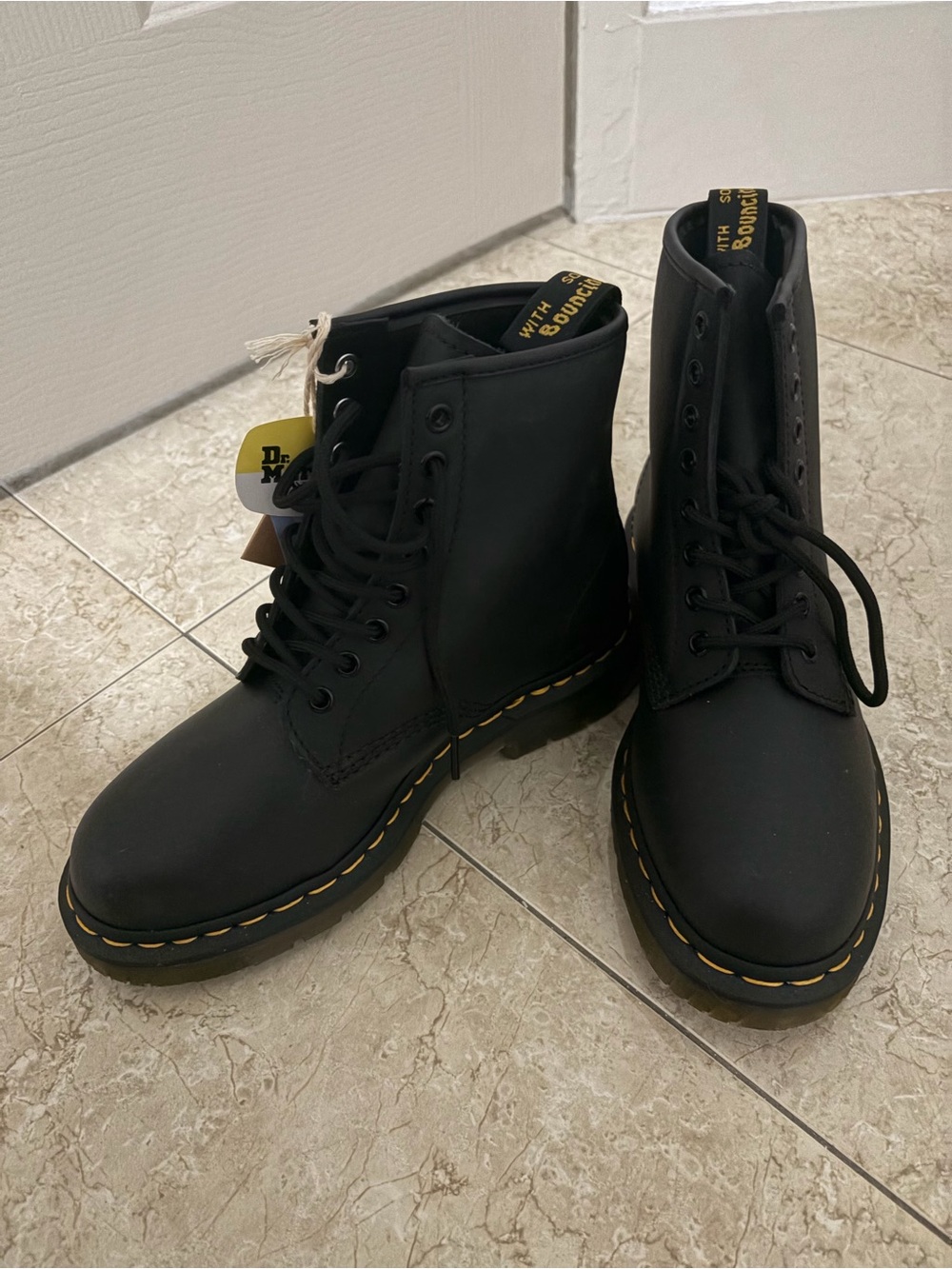 Dr. Martens Black Leather 8-Eye Lace-Up Boots with Yellow Stitching